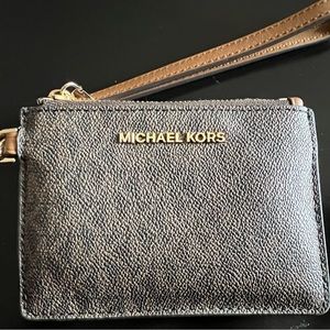 Gently used MK wristlet
